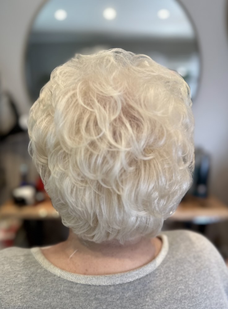 Short curly grey hair